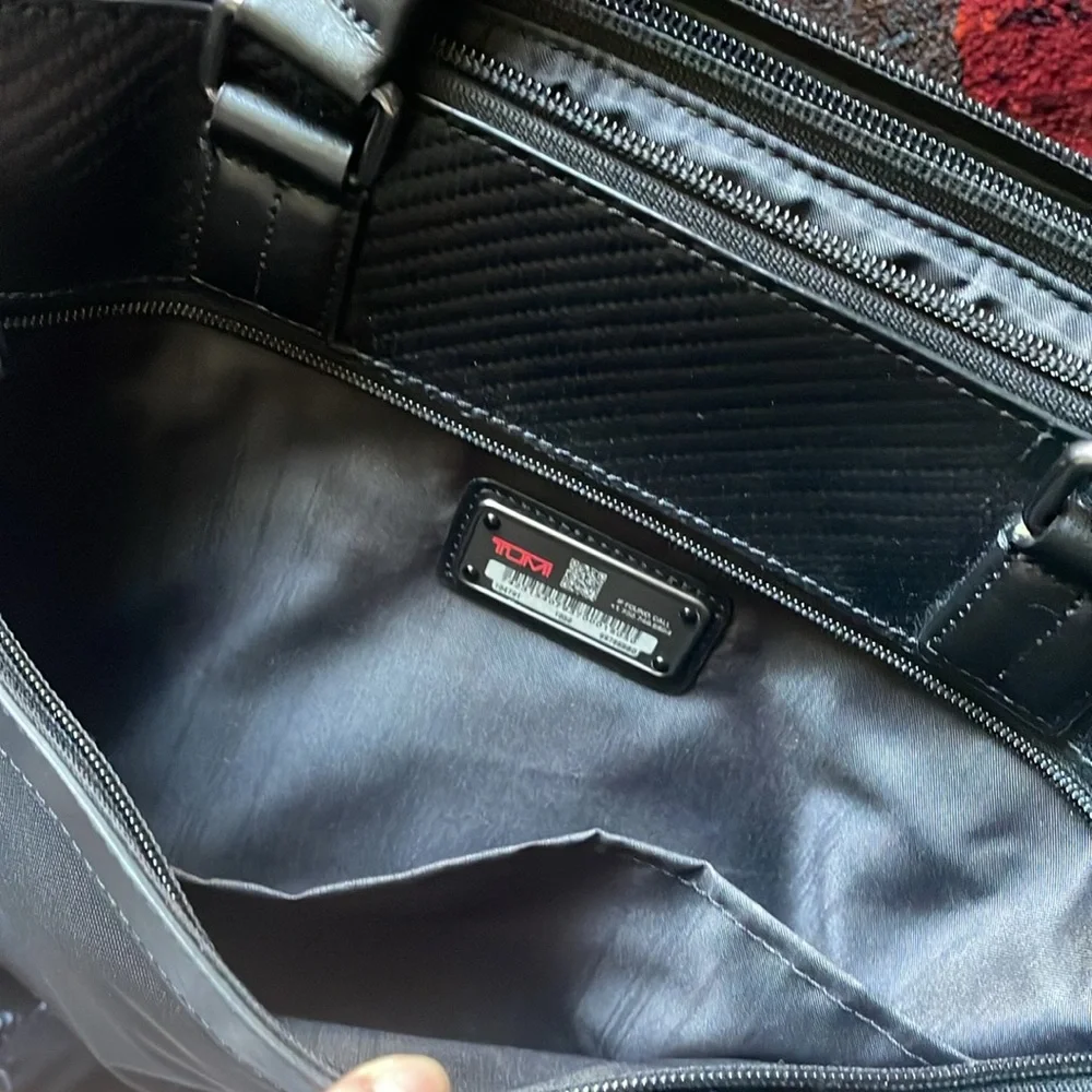 Tumi Canvas Black Laptop Bag with Carbon Fiber Accents